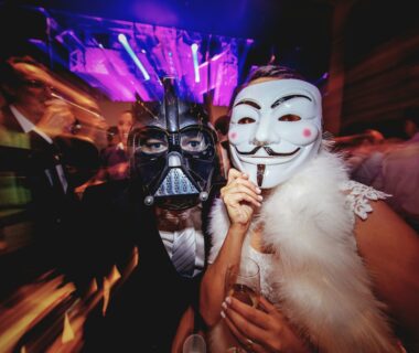 a couple of people that are wearing masks