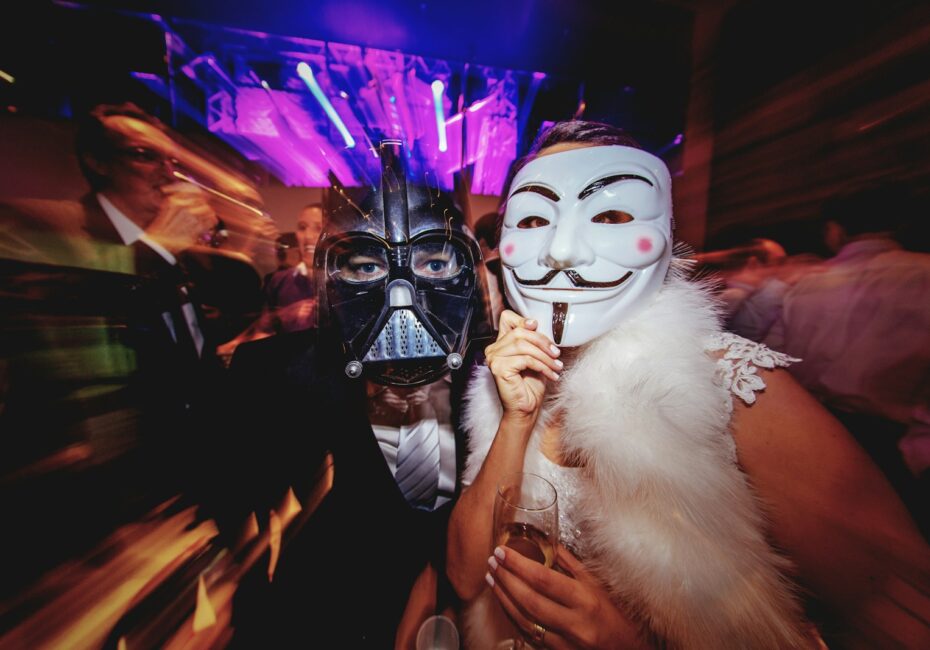 a couple of people that are wearing masks