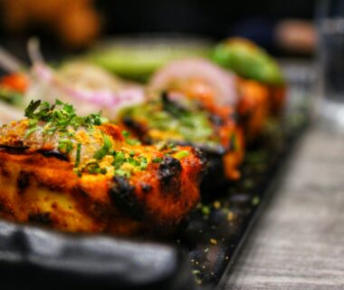 selective focus photography of grilled beef tops with vegetables